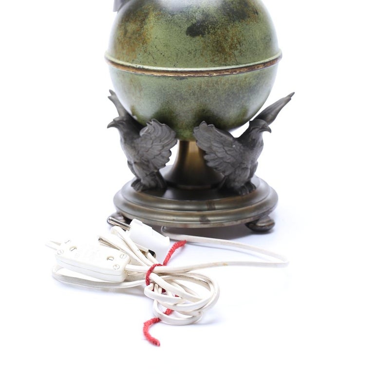 Ystad-Metall Table Lamp with Patinated Globe and Bird Motif, Sweden 1930's